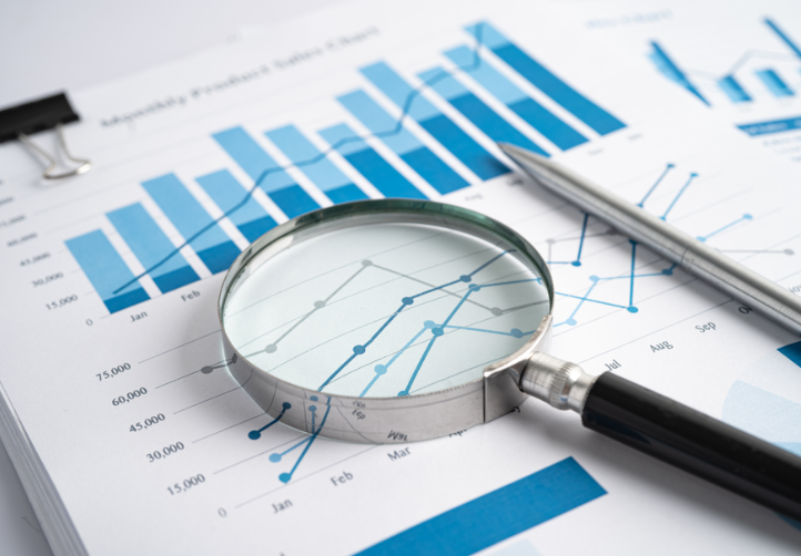 Magnifying Glass Overlaying a Line Graph